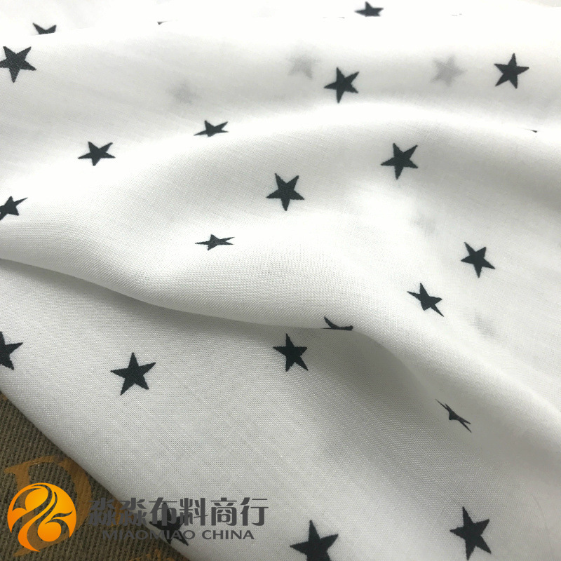 白色底星星印花人造棉水玉波点布料 五角星连衣裙子手工布艺面料