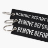 Foreign trade popular embroidery keychain latch rope embroidery key chain black back white word white characters Remove before Flight