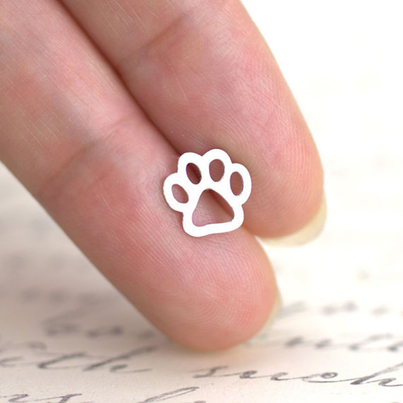 hot-saling hollow  alloy plating cute animal cat and dog foot earrings wholesale