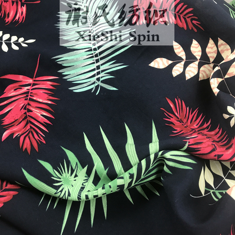 2022春夏藏青色底树叶印花印花人造棉布料 连衣裙子手工布艺面料