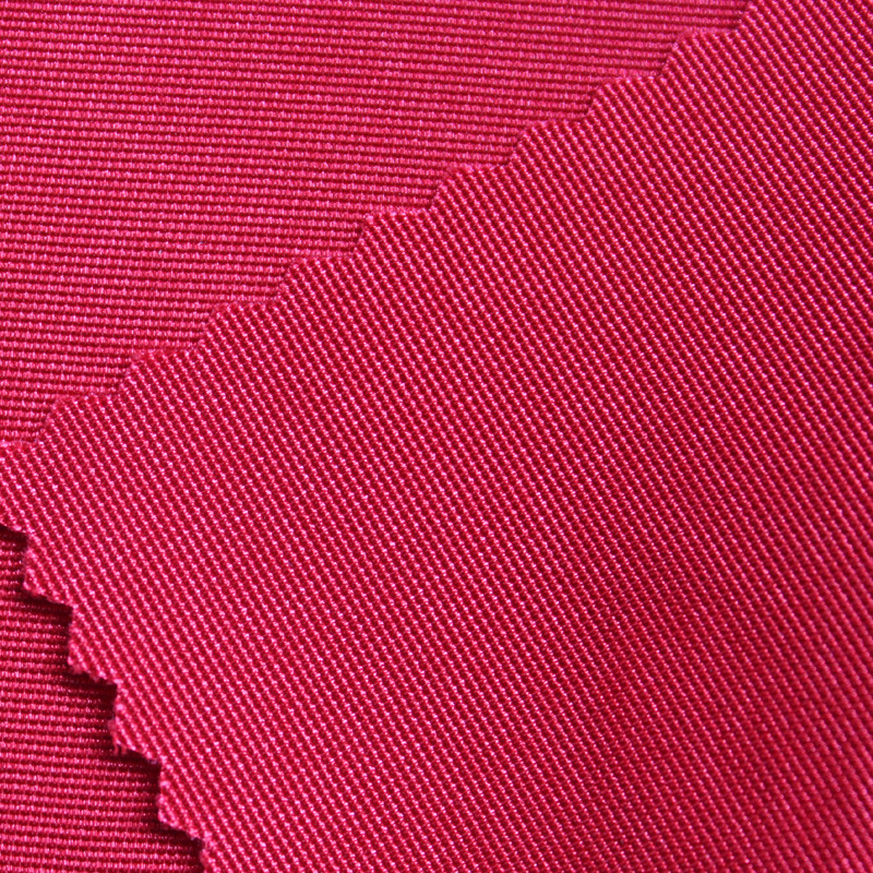 涤纶化纤有光弹力直贡缎 50D三角异形丝*75D+40D 飞行夹克风衣料