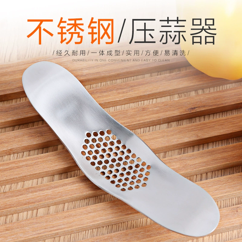 Инструменты для кухни из нержавеющей стали: пресс для чеснока, ручной измельчитель чеснока, бытовой пресс для чеснока.