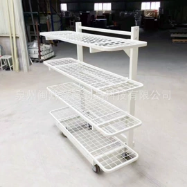 工作台;仓储货架;服装机械设备