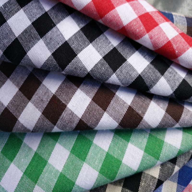 厂家现货梭织格子布黑白TC涤棉色织提花面料衬衫全涤时装青年布料