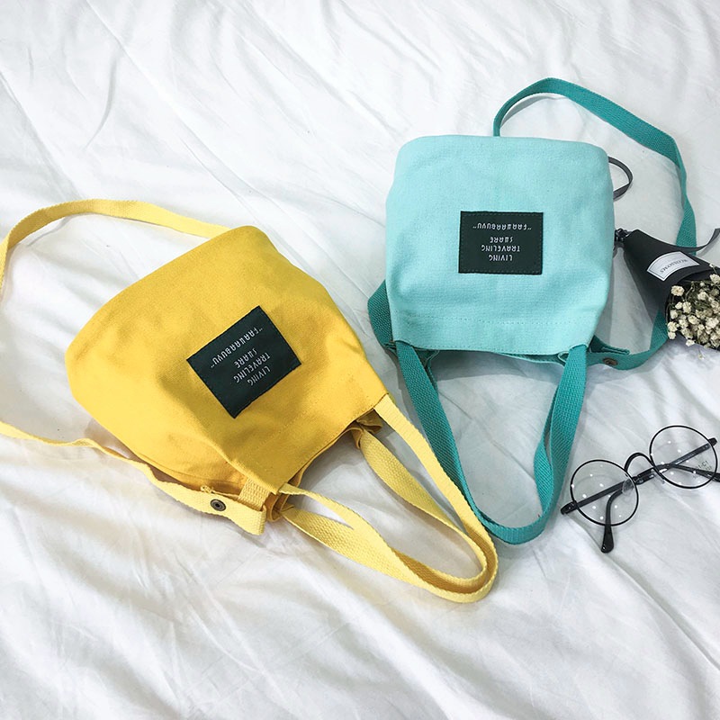 Women's bag new letter bucket canvas bag trendy shoulder crossbody portable children's small bag mobile phone