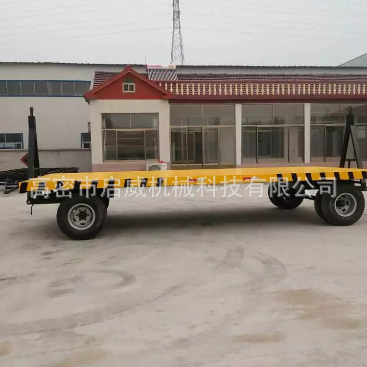 双向牵引充气胎平板拖车  可移动运输工具车   20吨全挂平板拖车