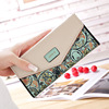 2023 new Korean version of the pastoral floral floral diamond contrasting color envelope with three folding folding folded cockle long ladies wallet