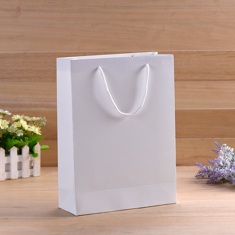 服装手提袋定制印刷 批发纸袋定做礼品 广告袋印logo 订做包装袋