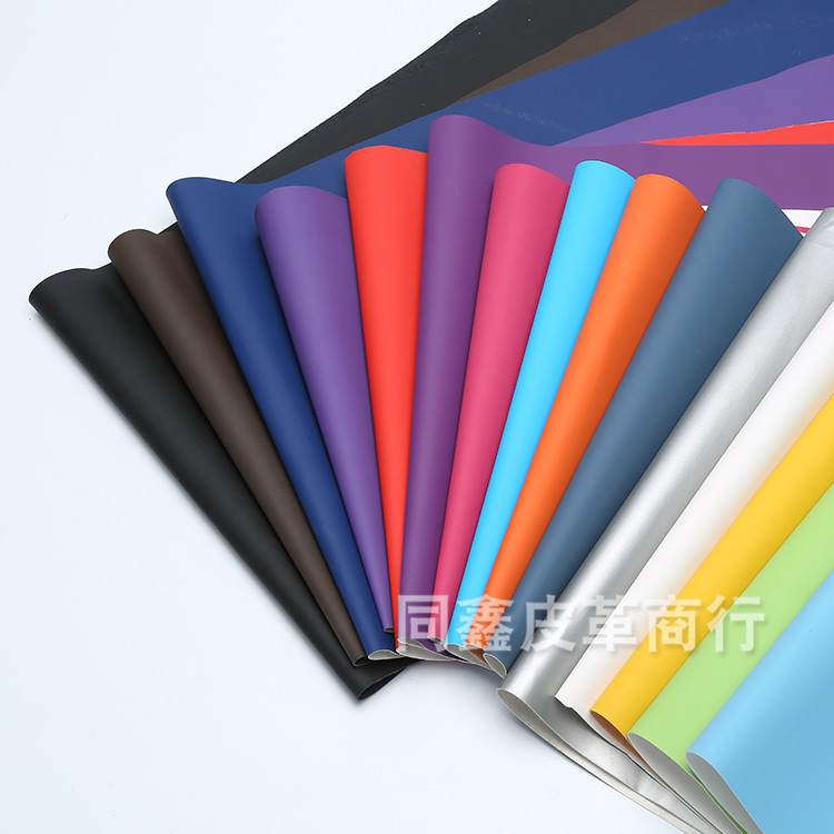 厂家批发 磨砂革平纹料 化妆包收纳袋配饰人造革