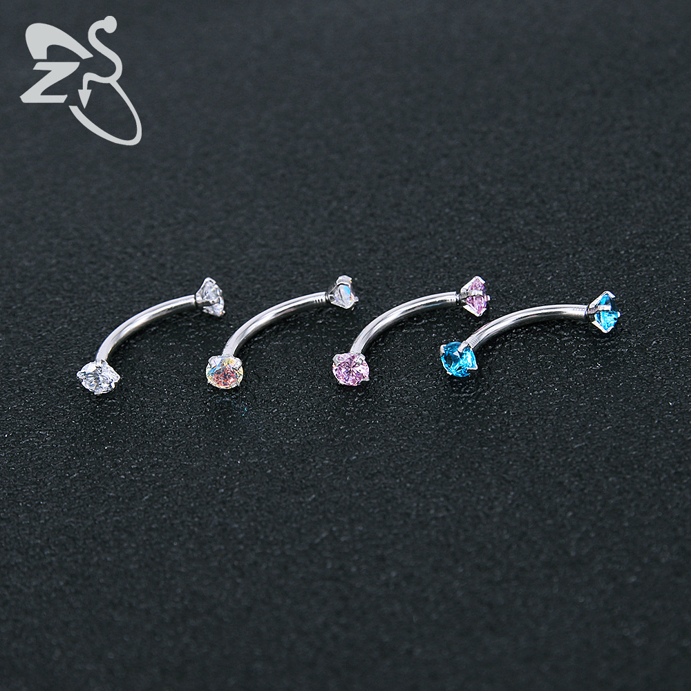 Silver pointed spike labret stud material detail