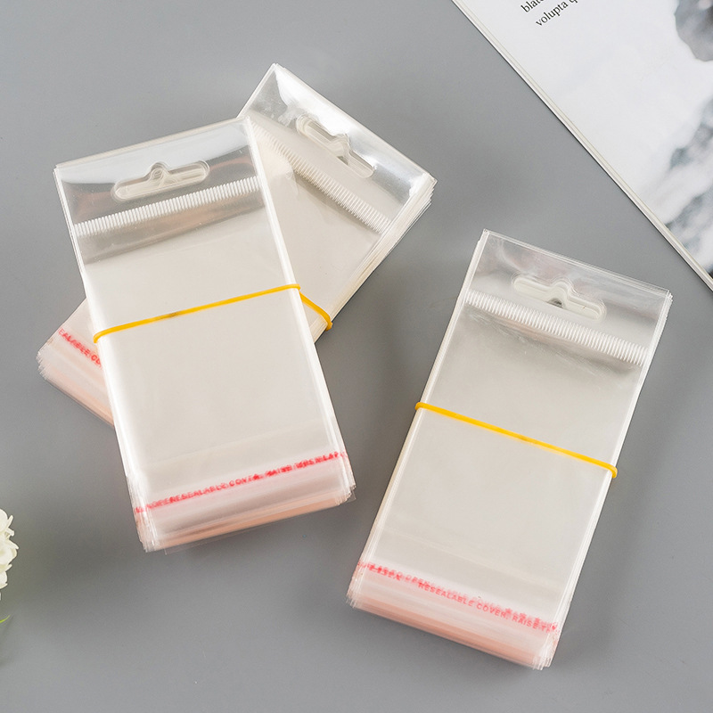 可订opp卡头袋飞机孔挂孔袋吊卡 手机壳袜子用自粘opp袋子印刷