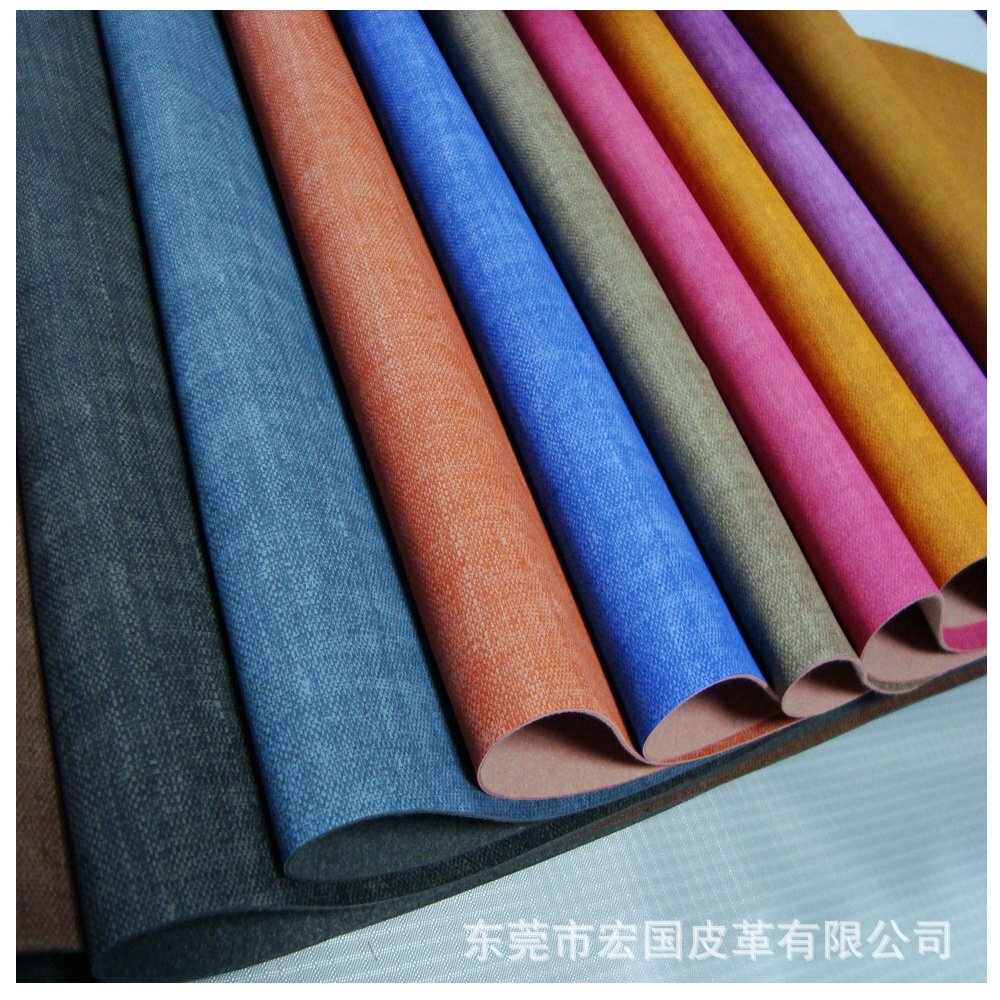 现货直销1.3mm牛仔布纹水性PU皮革皮子假皮革面料热压变色商标革