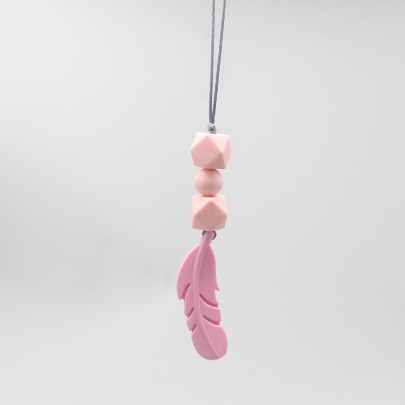 Popular pluma mordedor collar bebé mordedor palo silicona collar mordedura pegamento grado alimenticio nuevo comercio exterior al por mayor