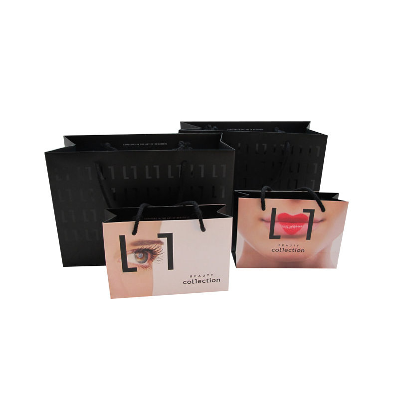 波点服装手提袋 儿童卡通牛皮纸礼品袋 童装打包纸袋