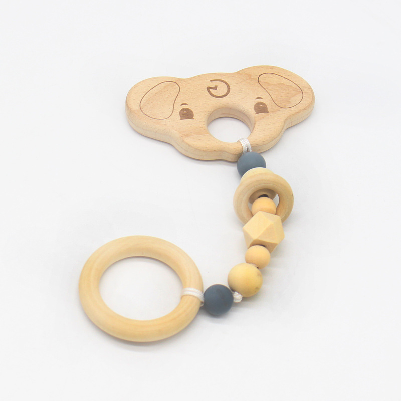 Suministros de bebé juguete de haya mordedor bebé Seguridad Protección del Medio Ambiente anillo de cuentas de silicona dientes molienda palo nuevo estilo