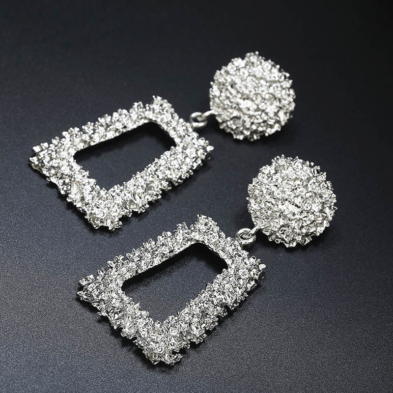 Exaggerated   Simple Geometric Embossed Flower Earrings display picture 5