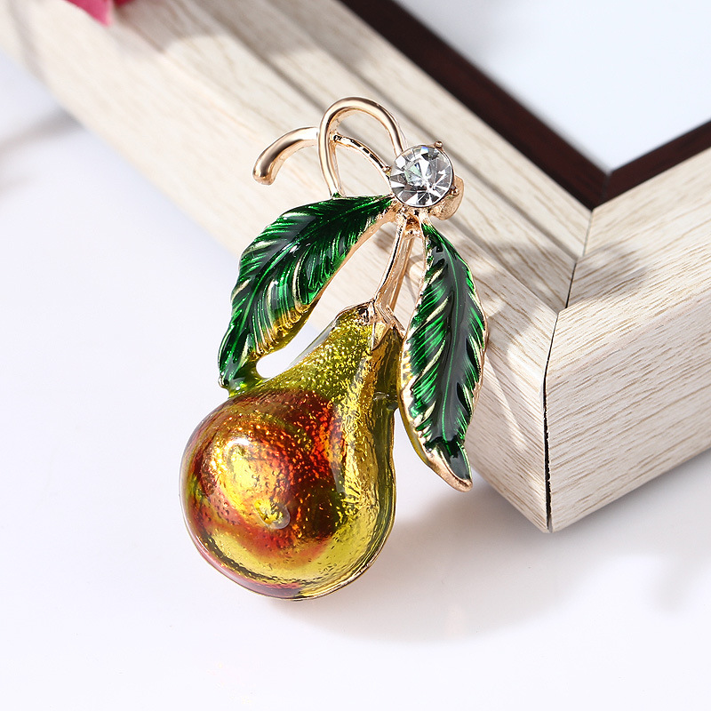 Spilla a forma di zucca in smalto e lega accessorio elegante_voghion.com