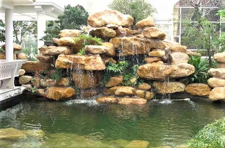 19高档黄蜡石假山布景效果