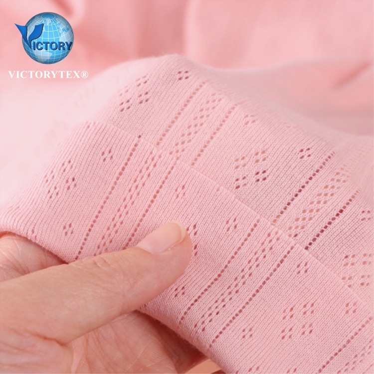 移圈罗纹布全棉婴童装面料针织纬编镂空电脑大提花螺纹移圈罗纹布