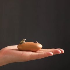 Manufacturer wholesale tea seat ornaments Yixing purple sand tea pet water spraying frog watermelon pumpkin lotus seed gourd tea set ornaments