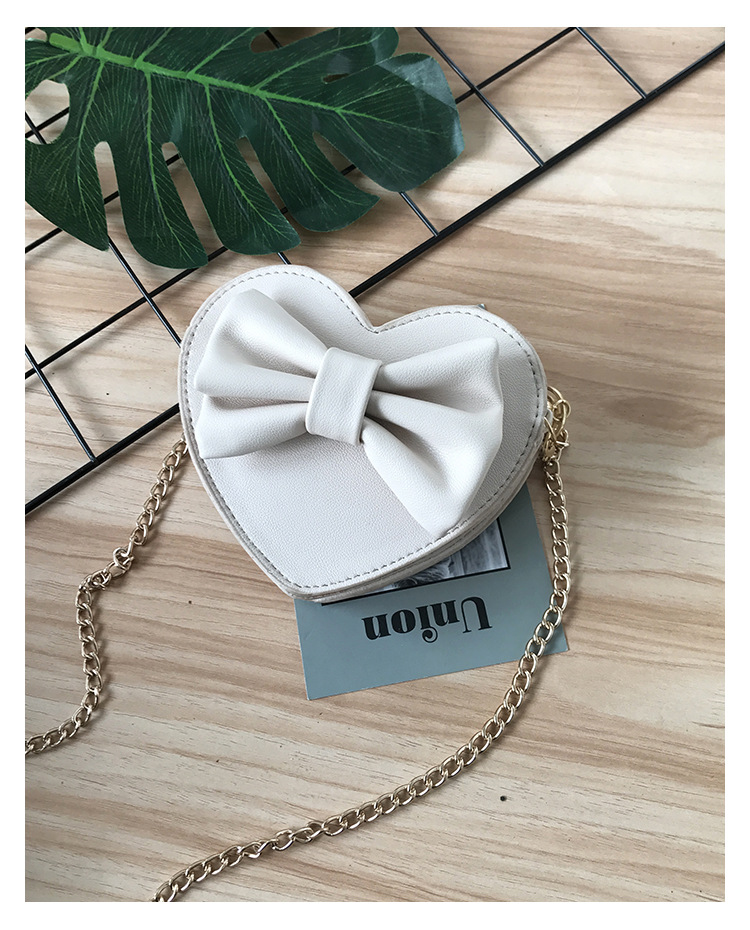 Unisex Small Pu Leather Solid Color Bow Knot Cute Heart-shaped Zipper Crossbody Bag display picture 38