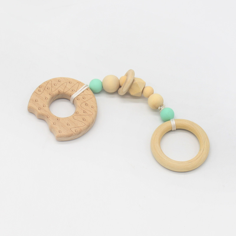 Suministros de bebé juguete de haya mordedor bebé Seguridad Protección del Medio Ambiente anillo de cuentas de silicona dientes molienda palo nuevo estilo