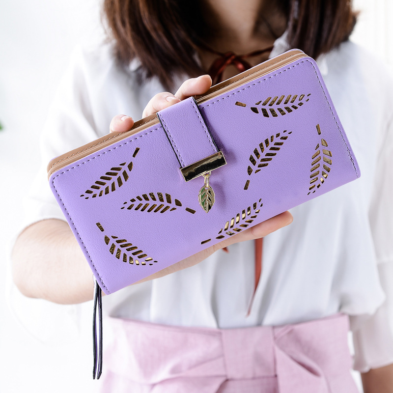 2024 Summer New Korean Fashion Trend Versatile Women's Long Hollow Leaf Handheld Bag Mobile Card Bag_voghion.com