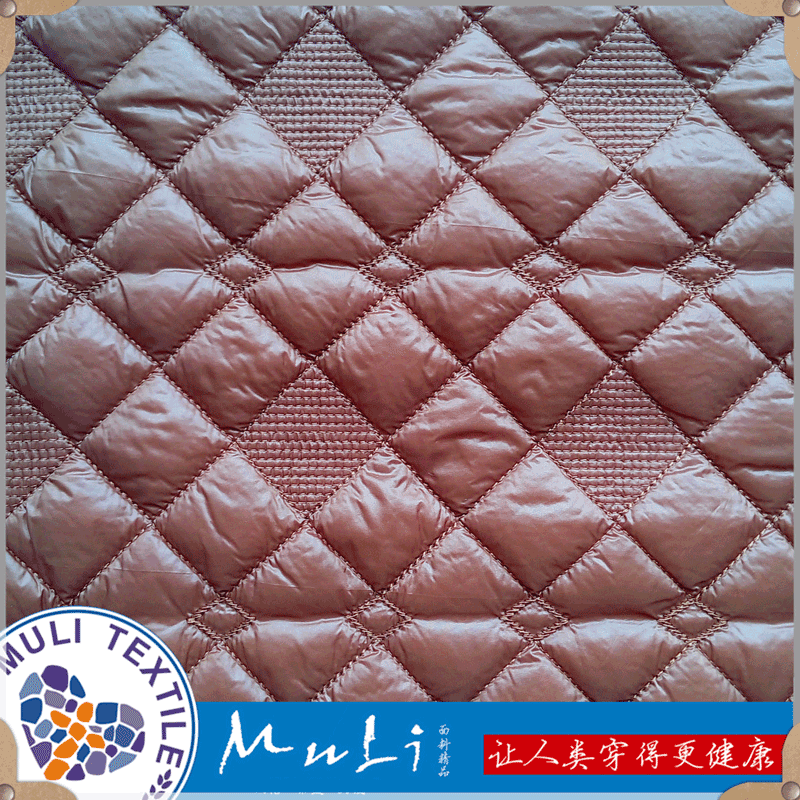 绍兴厂家大小菱形格绗绣绗缝夹棉涤塔夫面料棉服地垫电脑绣花供应|ms