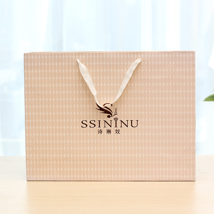 厂家直供服装手提纸袋定 制礼品包装袋广告宣传白卡纸手提袋定 做