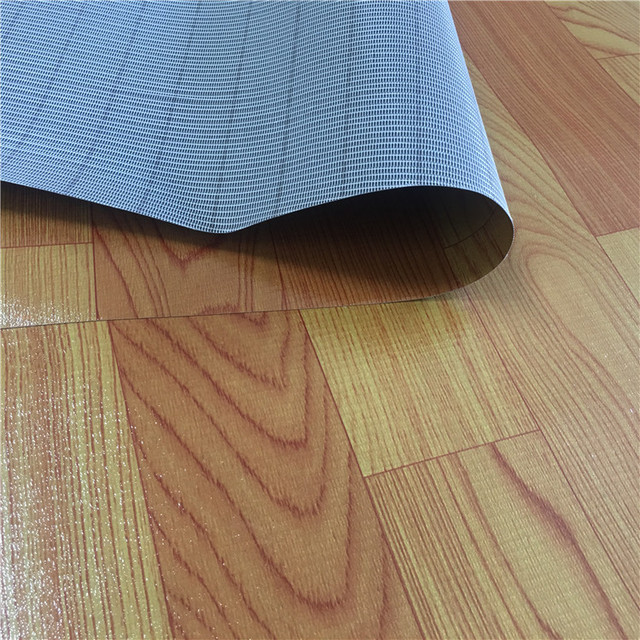 Giả gỗ hạt PVC sàn da nhà bảo vệ môi trường phòng ngủ mặc sàn hộ gia đình sàn mat ánh sáng hộp vải vải bảo vệ giấy Sàn nhựa PVC