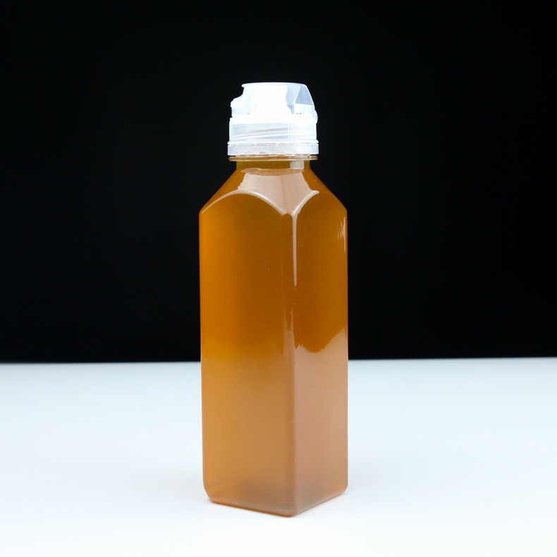 定制塑料PET包装透明密封方形尖嘴挤压冷泡茶果汁创意蜂蜜瓶