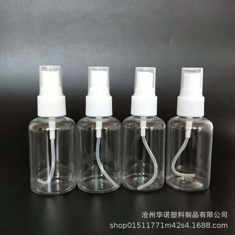Al por mayor grasa 50ml botella de spray transparente redonda mascota niebla fina pequeña regadera cosmética líquido sub-embalaje botella de spray de plástico