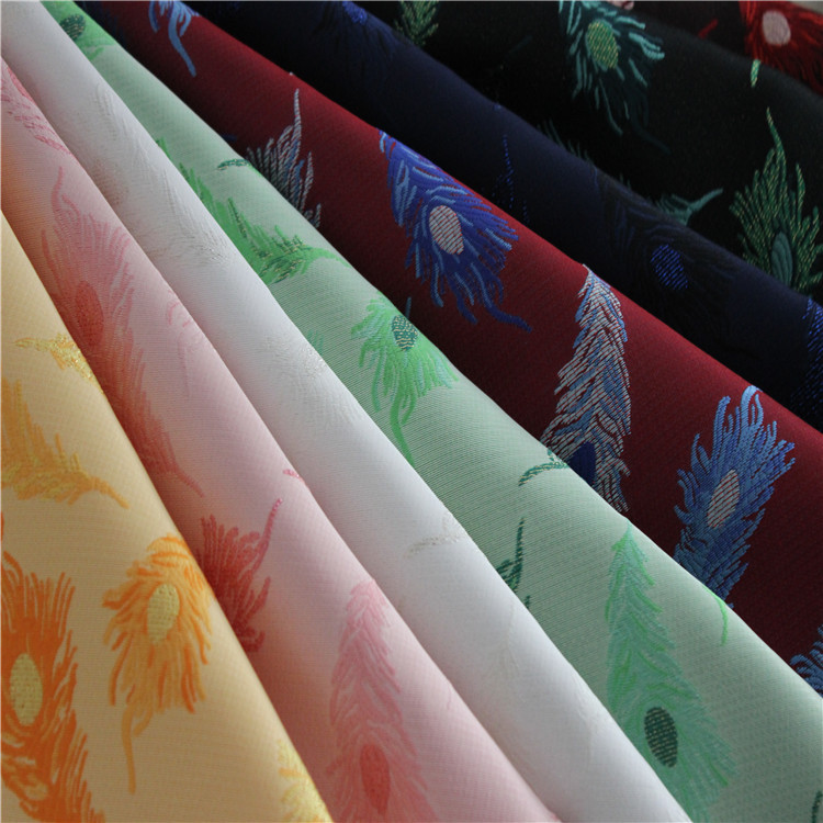 金丝孔翟毛图案梭织色织提花布面料适用于服装装饰沙发布鞋子布