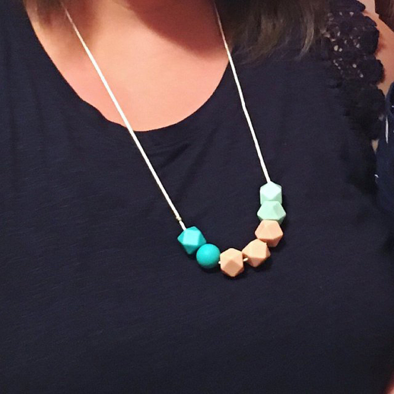 Nueva silicona mordedor collar masticable colgante bebé mordedura mordedor palo collar Amazon