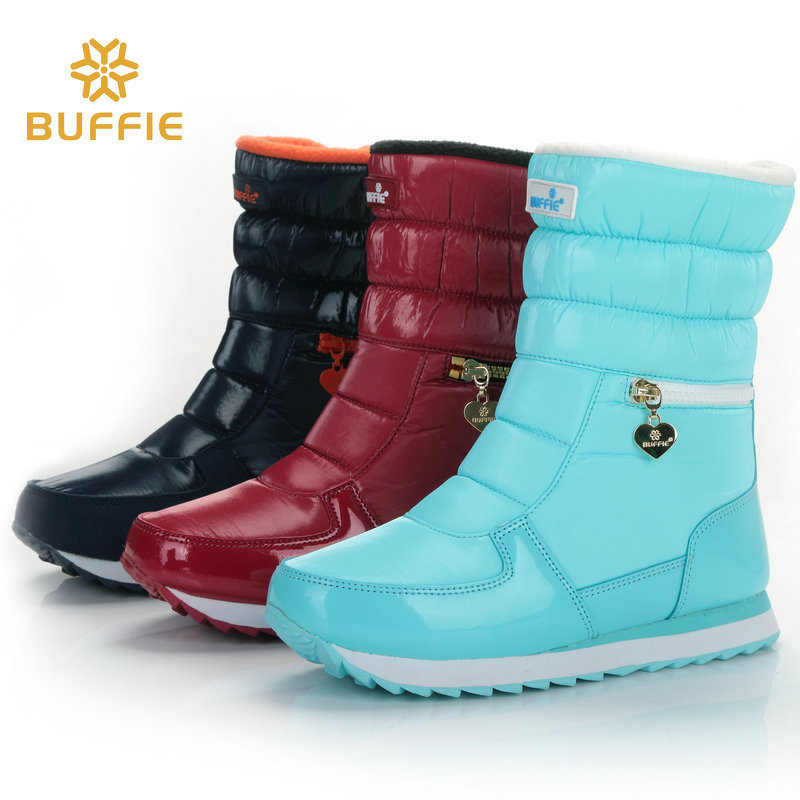 Botas de nieve de las mujeres de fondo plano a media pantorrilla impermeable cremallera engrosada zapatos de algodón transfronterizo Taobao suministro al por mayor entrega de una sola pieza