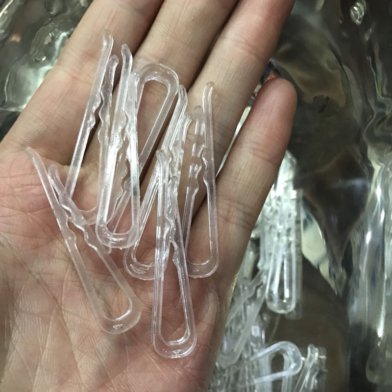 厂家销售现货3.8cm和4.5CM的服装用的透明衬衣夹 塑料有齿衬衣夹