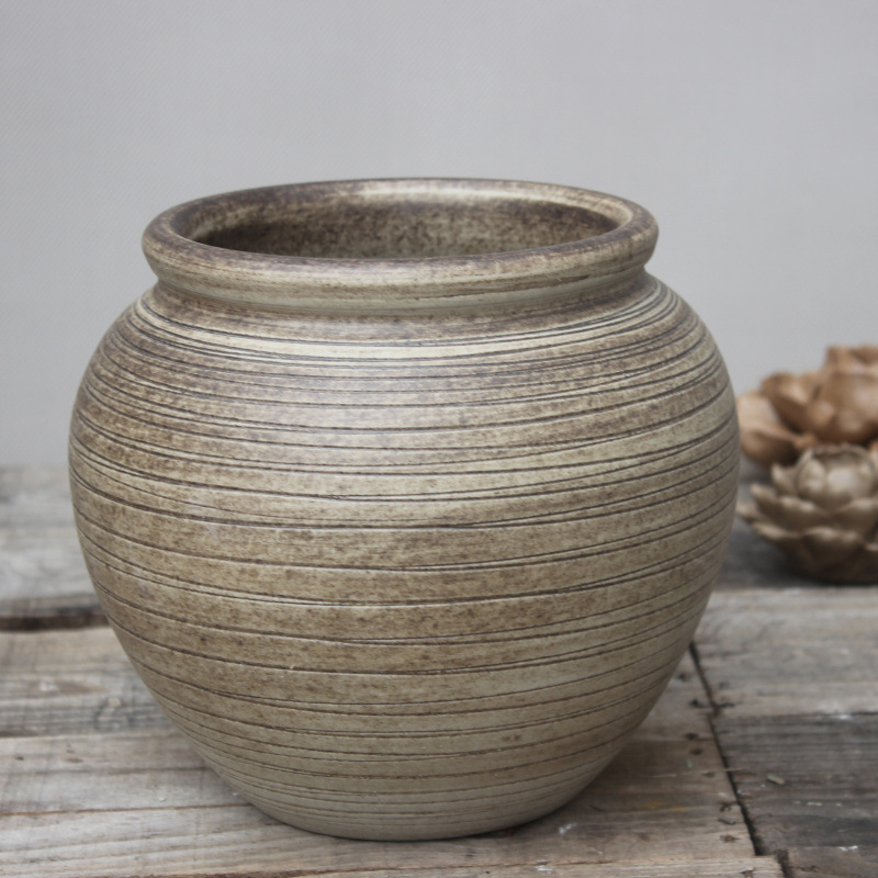 La literatura y el arte artesanales retro hacen tres conjuntos de jarrones, adornos y macetas artesanales en latas de cerámica seca de Old jingdezhen.