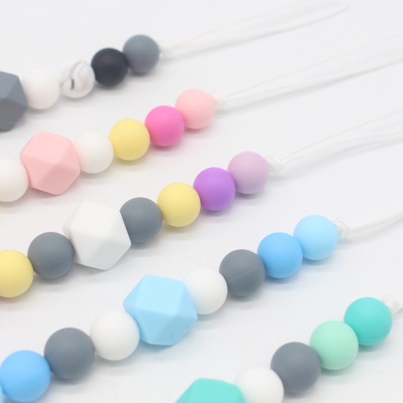 INS popular cadena de chupete suministros para bebés clip de chupete de silicona Amazon mordedor cadena anti-caída cinturón