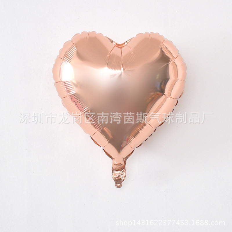 golden balloon heart shaped
