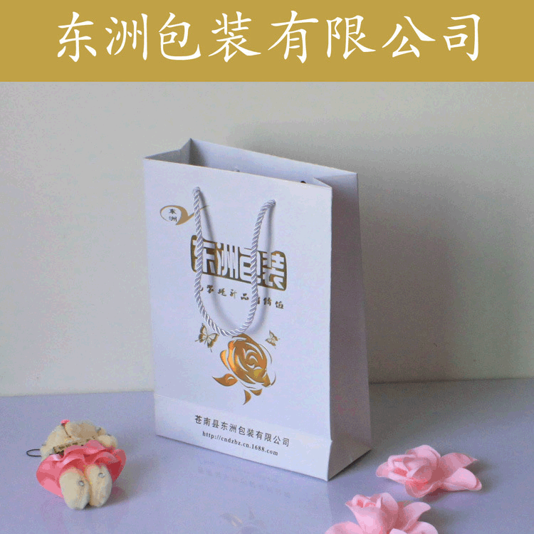 定制服装礼品包装袋购物茶叶手提袋白卡牛皮纸袋定做可印logo
