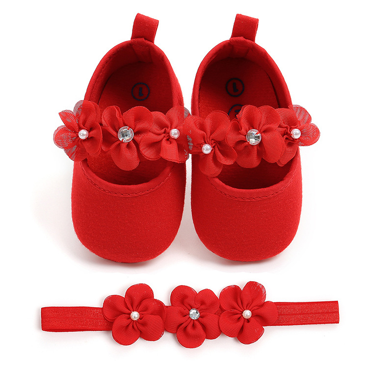 red baby shoes