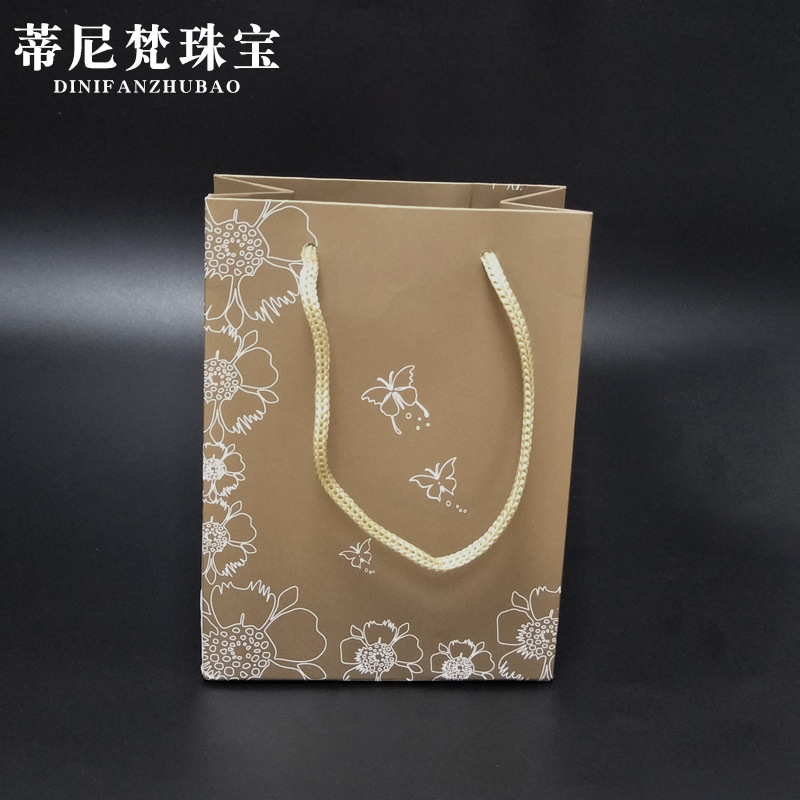 Bolso de regalo de papel Kraft bolso regalo joyería al por mayor accesorios de una pieza de entrega a juego bolsa de embalaje