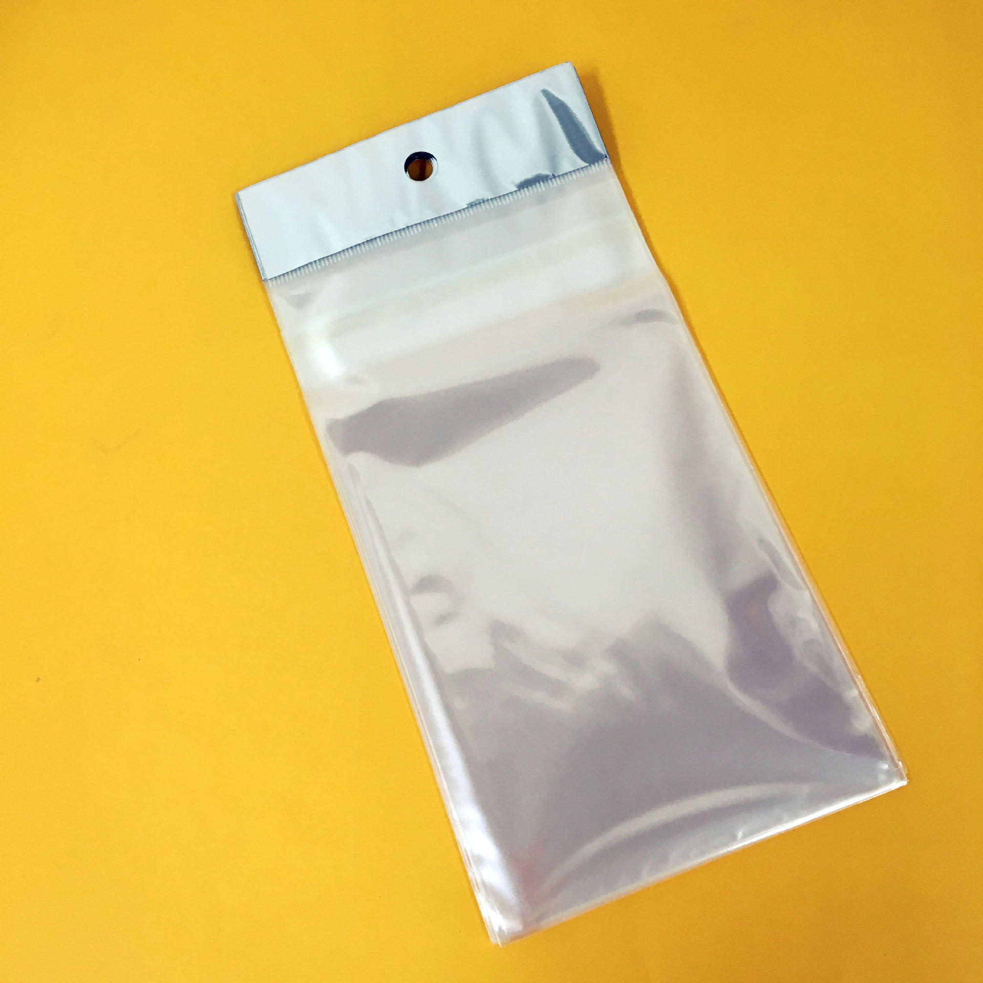 塑料透明OPP自粘包装珠光膜卡头袋