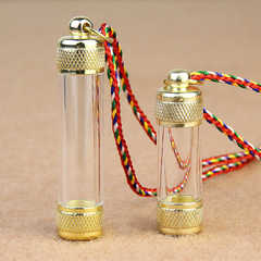 A transparent cinnabar box amulet tube for men and women, openable to hold relics and nectar pills, with cinnabar.