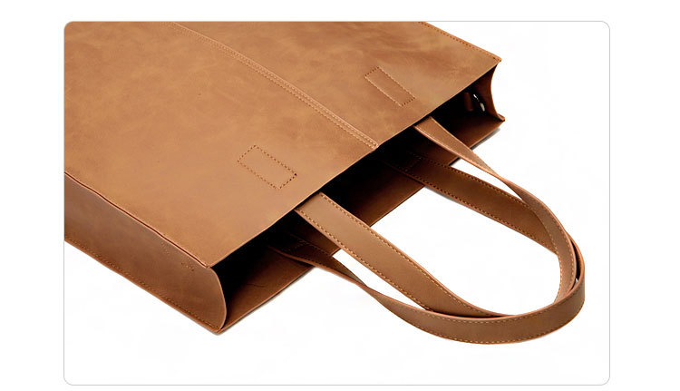 Korean version of fashionable PU leather shoulder bag, simple commuter men's and women's tote bag, square vertical crossbody large-capacity handbag_voghion.com