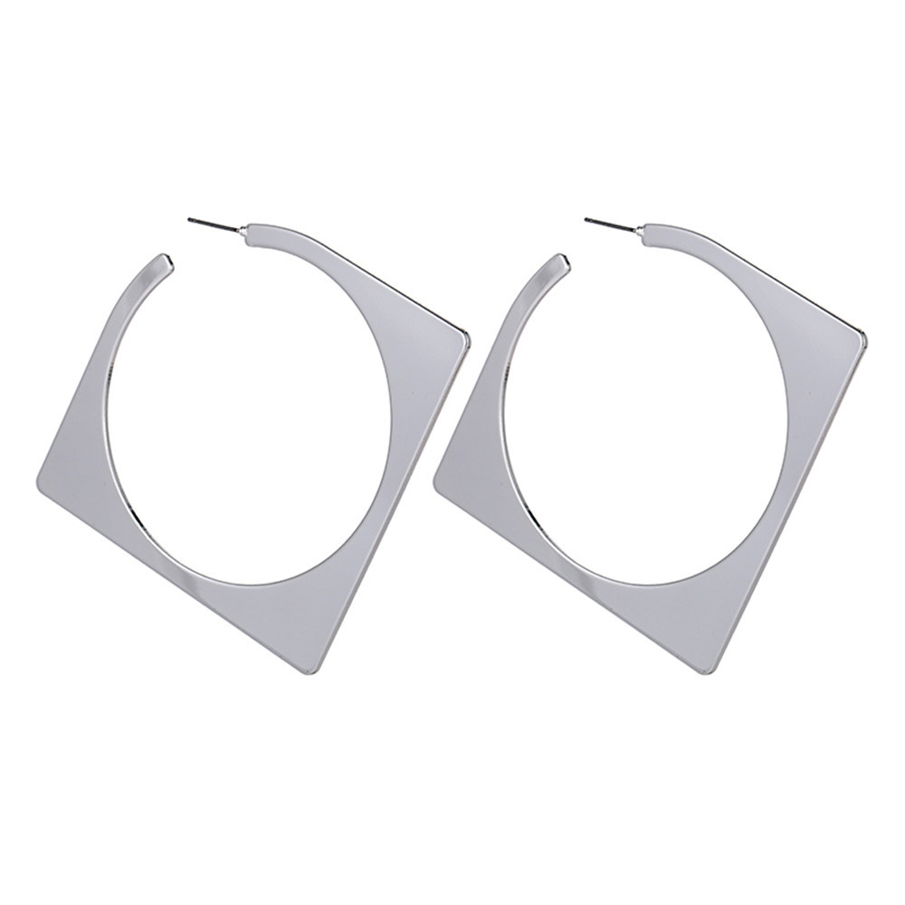 Diamond-shaped gold and silver geometric earrings