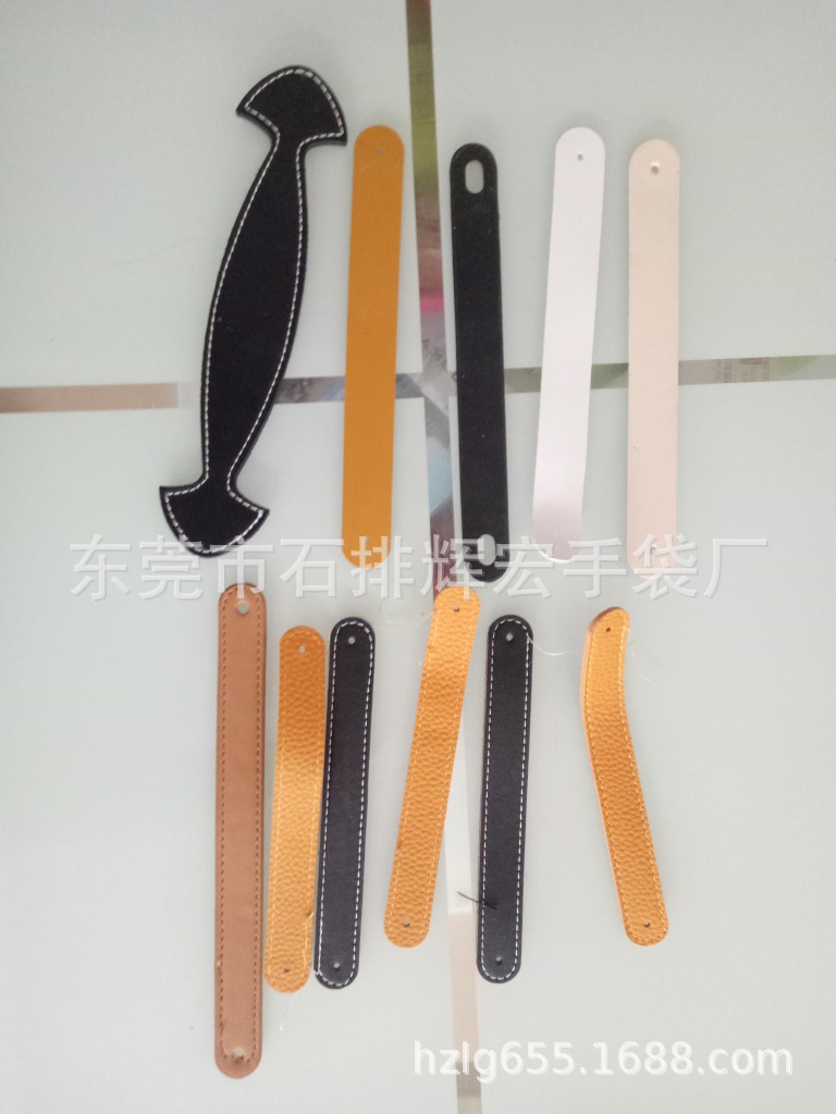 东莞手袋厂生产皮手挽带皮提手带皮拉手带音响皮手挽皮绳皮带皮手