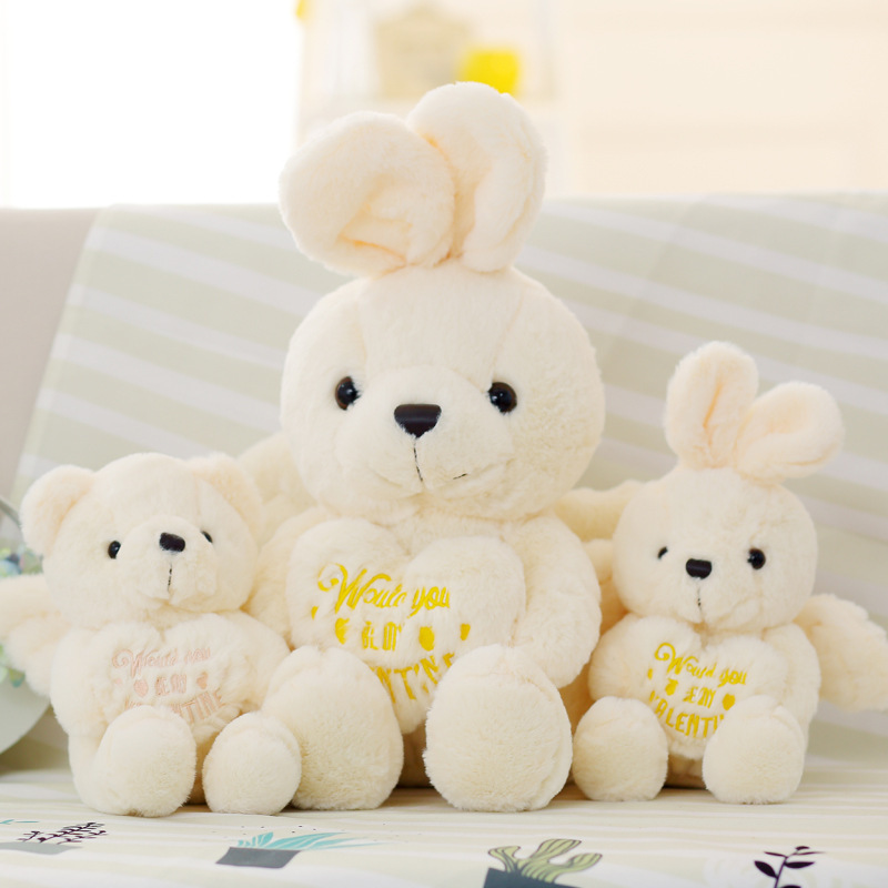 Cute angel hugs little bear love rabbit...