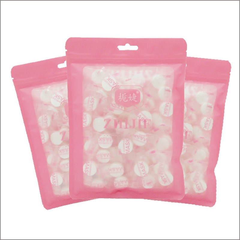 栀婕一次性压缩面膜纸 100粒糖果压缩纸膜 无纺布面膜扣膜布批发