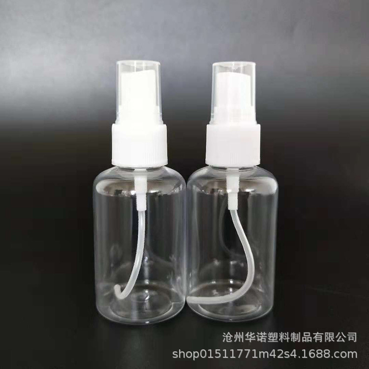 Al por mayor grasa 50ml botella de spray transparente redonda mascota niebla fina pequeña regadera cosmética líquido sub-embalaje botella de spray de plástico